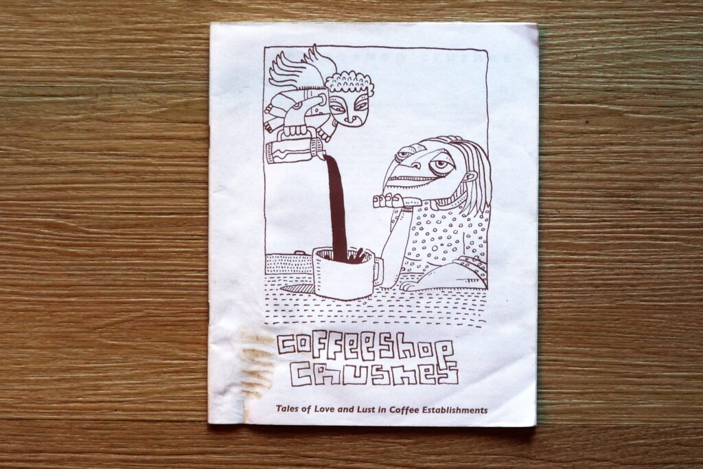 Front page of Coffeeshop Crushes zine with an illustration of an angel pouring coffee into a woman's mug.